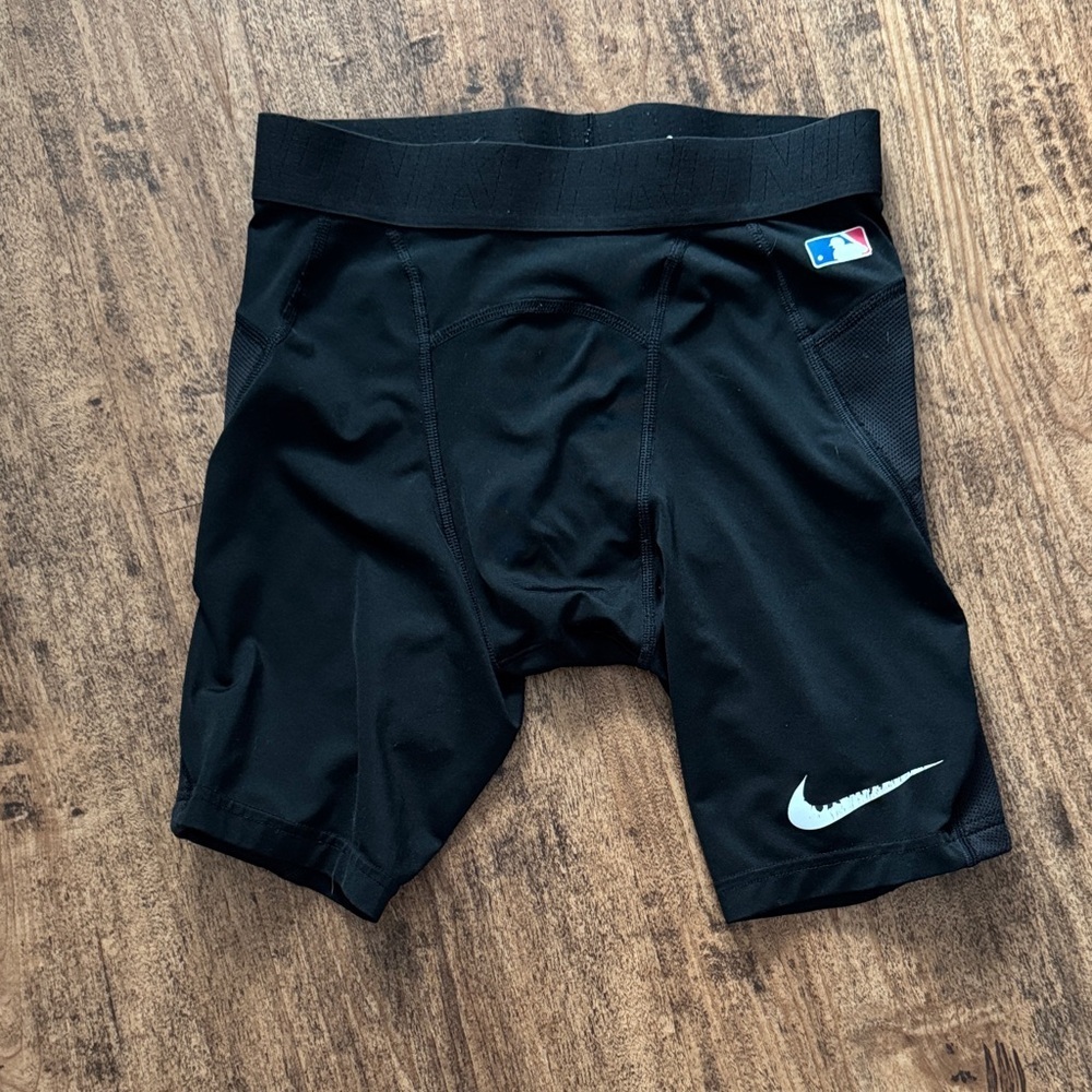 Nike Black Compression Shorts with White Swoosh